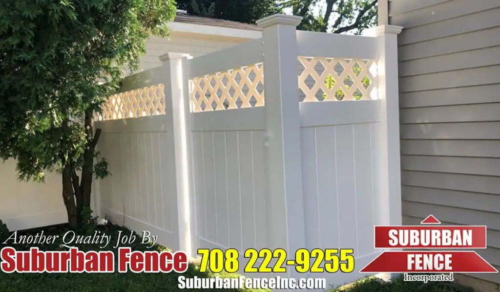 A white vinyl fence by Suburban Fence
