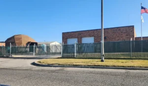 Commercial fence protecting facility perimeter for safety, access, and growth for Chicago’s growing businesses.